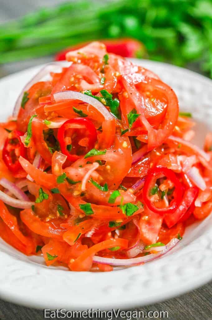 Tomato and Onion Salad on a white plate