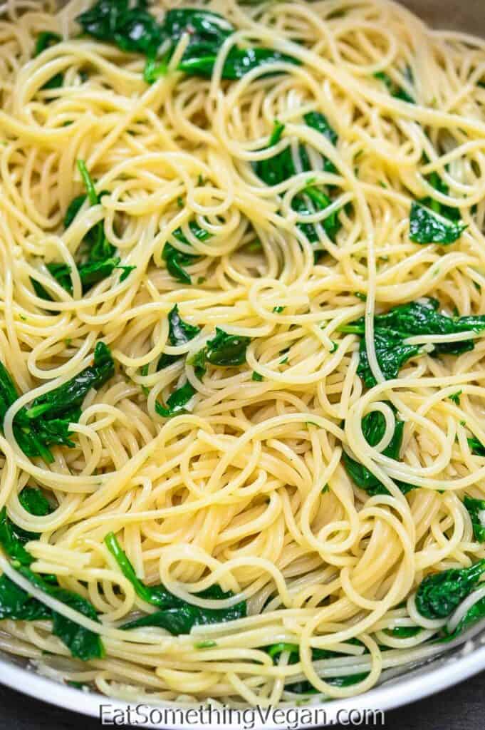 Spaghetti Aglio e Olio with Spinach in a skillet