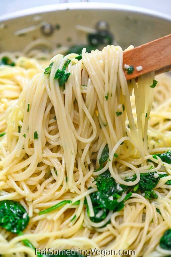 Spaghetti Aglio e Olio with Spinach in a skillet