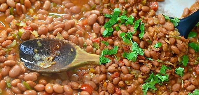 cooking pinto beans and adding lime juice
