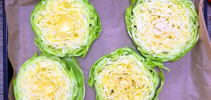 cabbage slices arranged on a baking tray 