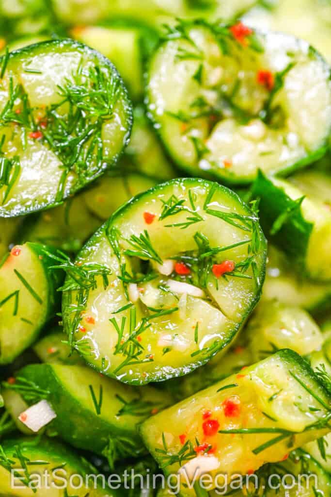 Smashed Pickled Cucumbers close-up with marinade