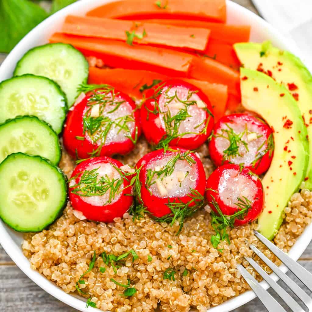 Radishes served with quinoa and veggies
