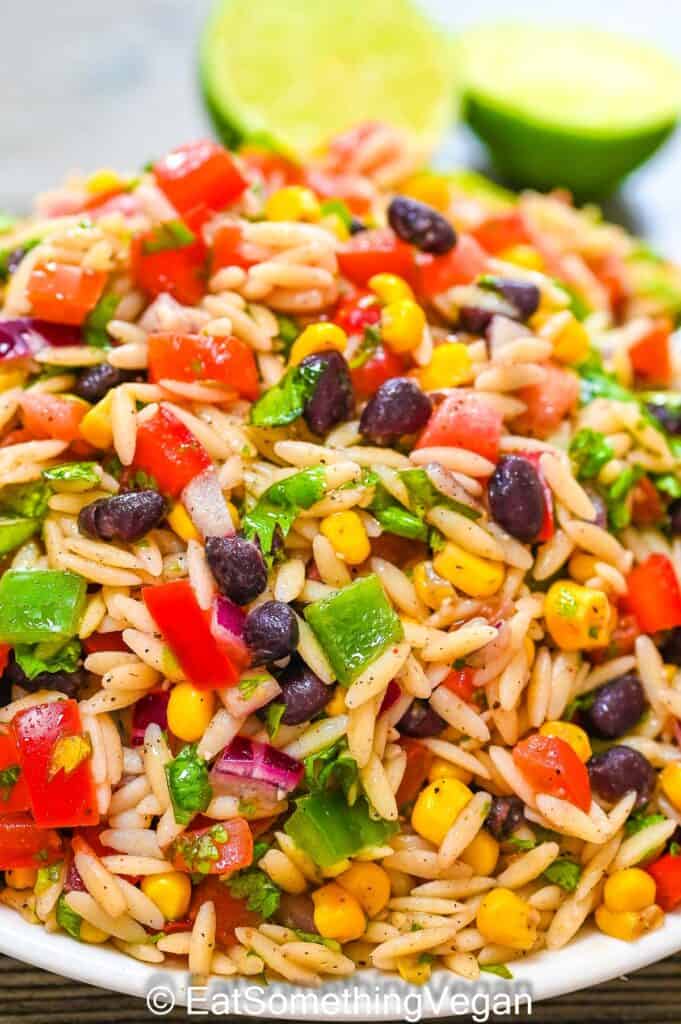 Summer Orzo Salad with lime in the background