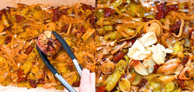 Roasted leeks, sun-dried tomatoes, and garlic in baking dish