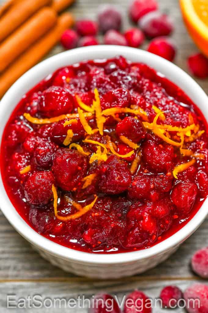 Cranberry Sauce in a bowl topped with orange zest