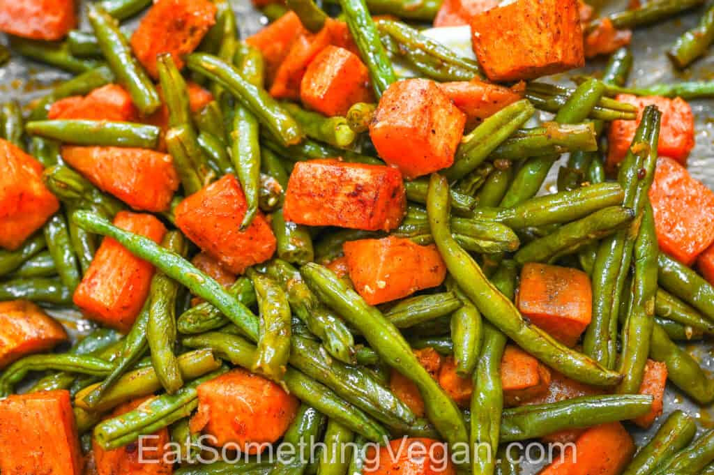 Sweet Potatoes and Green Beans roasted together on a baking sheet