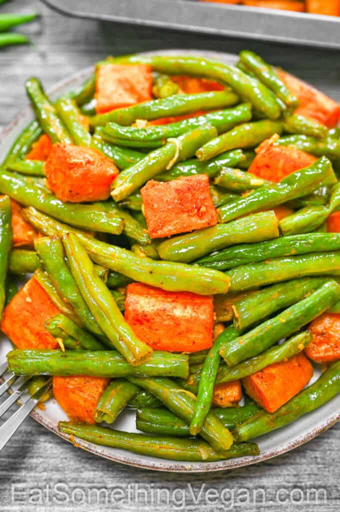 Sweet Potatoes and Green Beans served on a plate