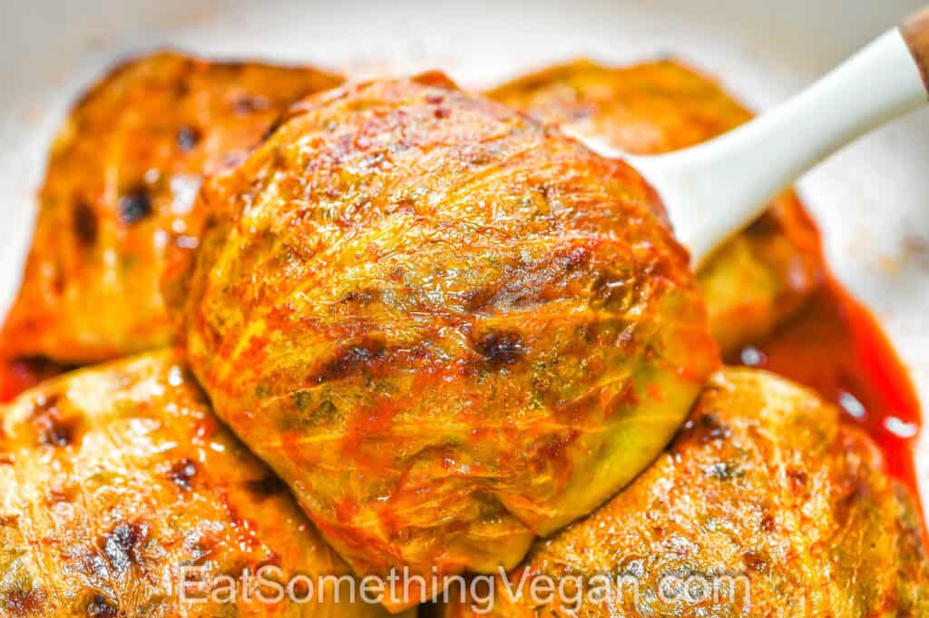 Baked Cabbage Bombs lifted on a spatula