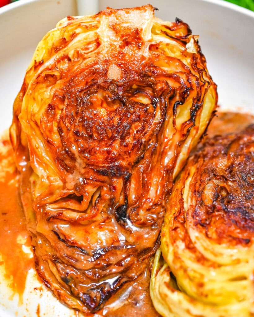 Roasted cabbage with miso butter in a skillet