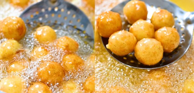 Frying potato balls in hot oil until golden and crispy