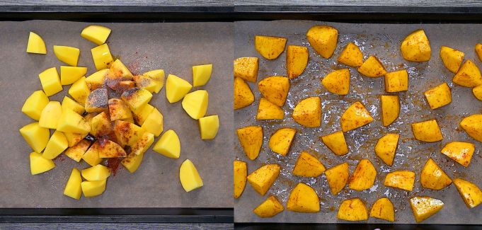Seasoned potatoes spread on a baking sheet before roasting