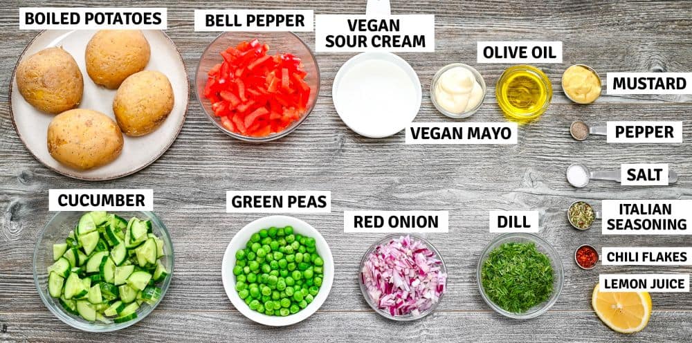 Ingredients for creamy smashed potato salad on a table