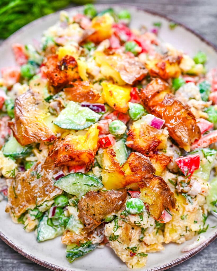 Creamy smashed potato salad with crispy roasted potatoes