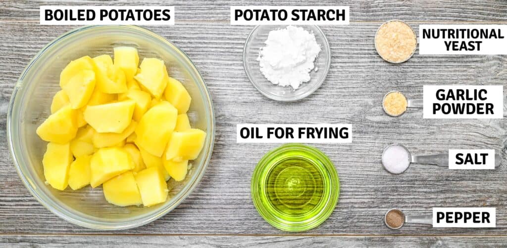 Ingredients for crispy potato balls laid out on a wooden surface