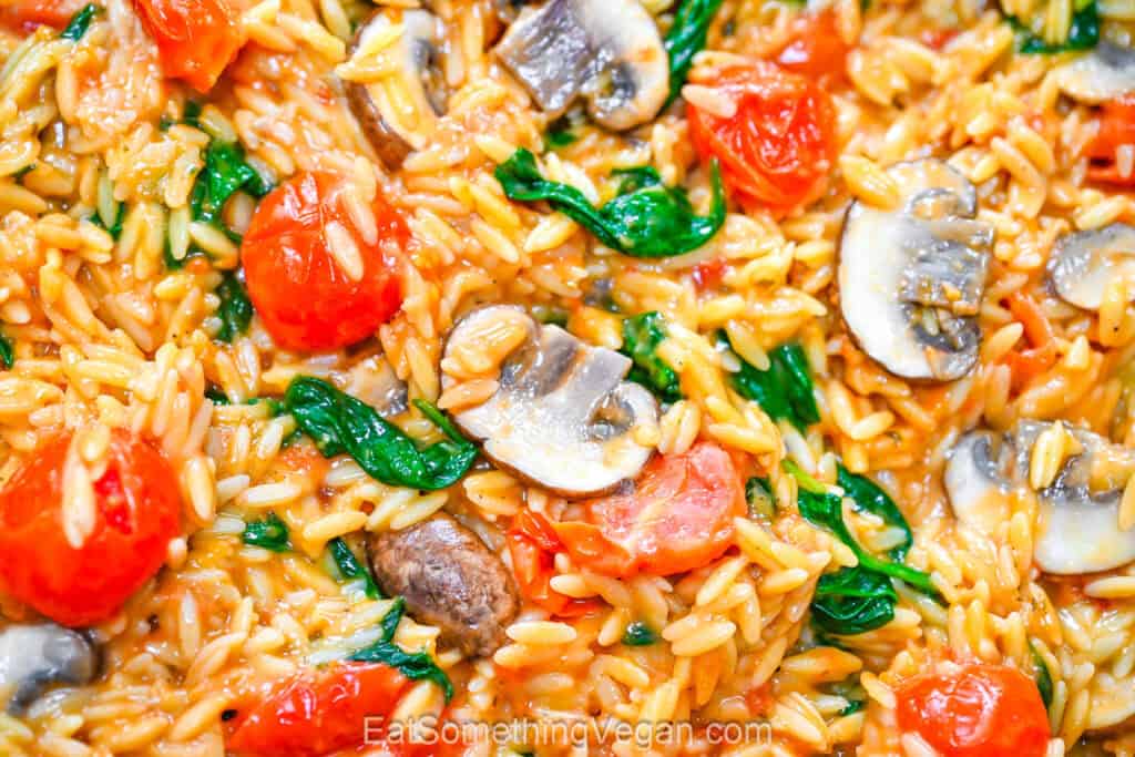 Bowl of creamy orzo with vegetables