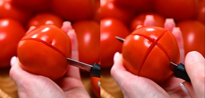 scoring tomatoes with a knife