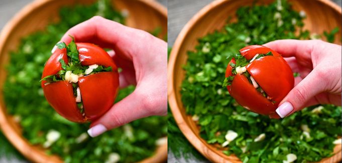 stuffing tomatoes with garlic and herbs
