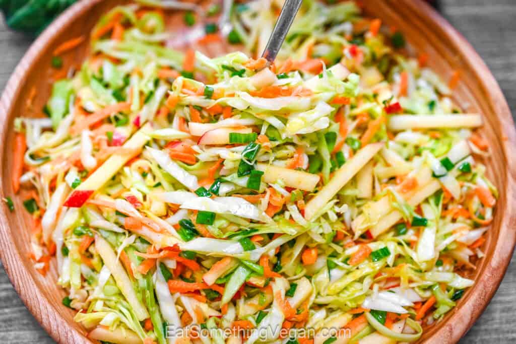 Fresh crunchy cabbage apple salad in a bowl