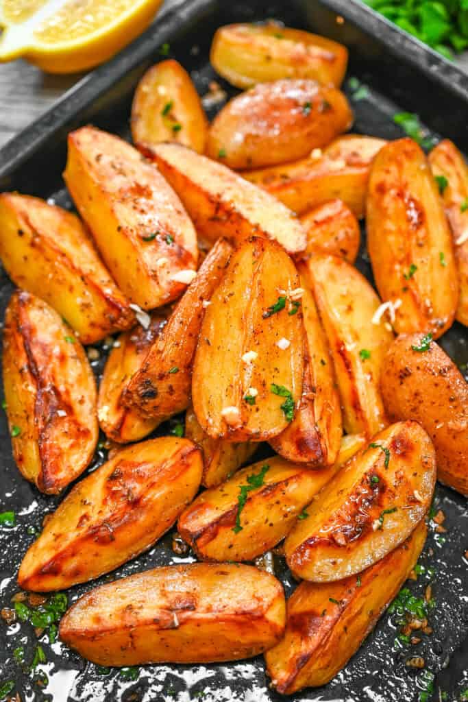 Crispy lemon garlic potato wedges with parsley