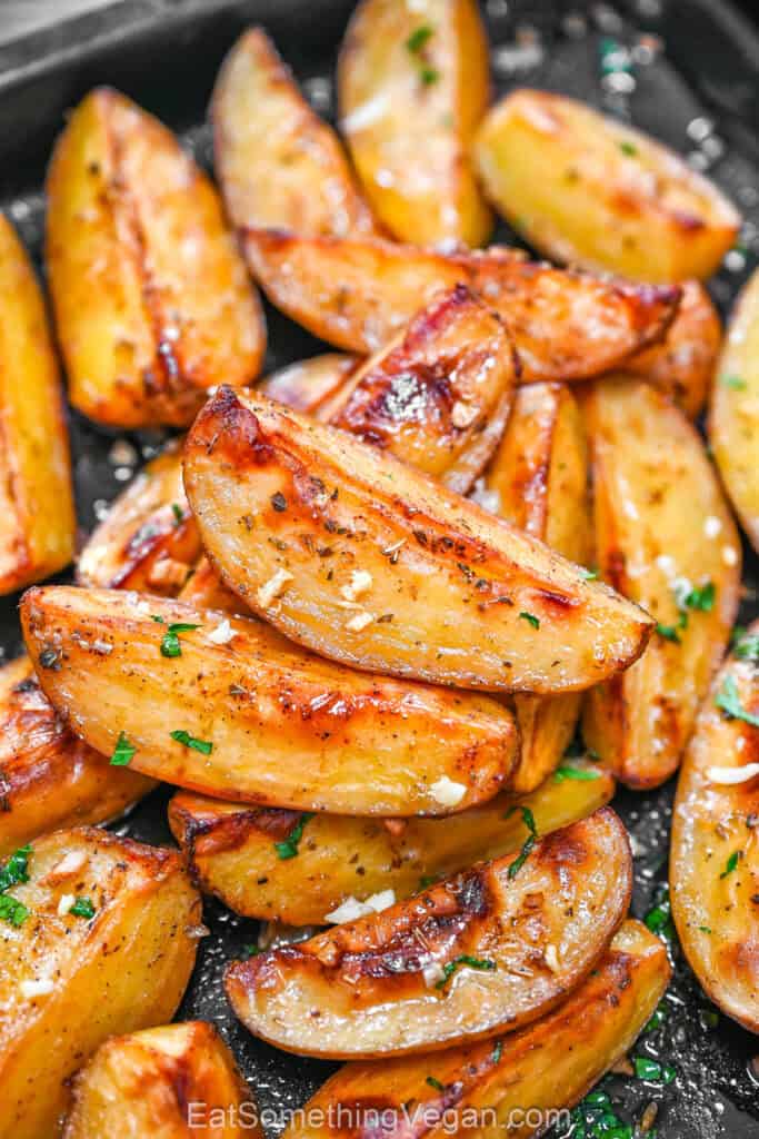 Crispy lemon garlic potatoes in a baking dish