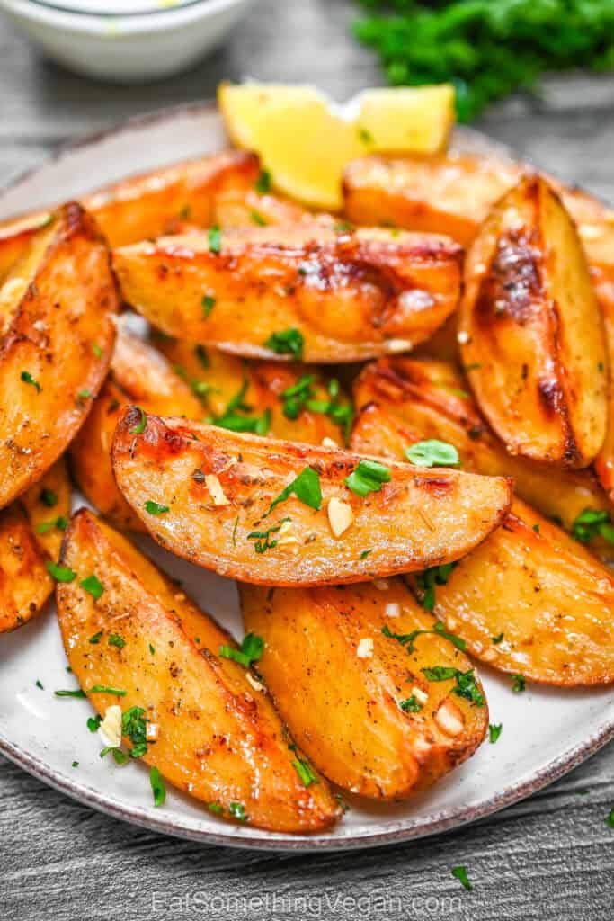 Crispy lemon garlic potatoes on a plate