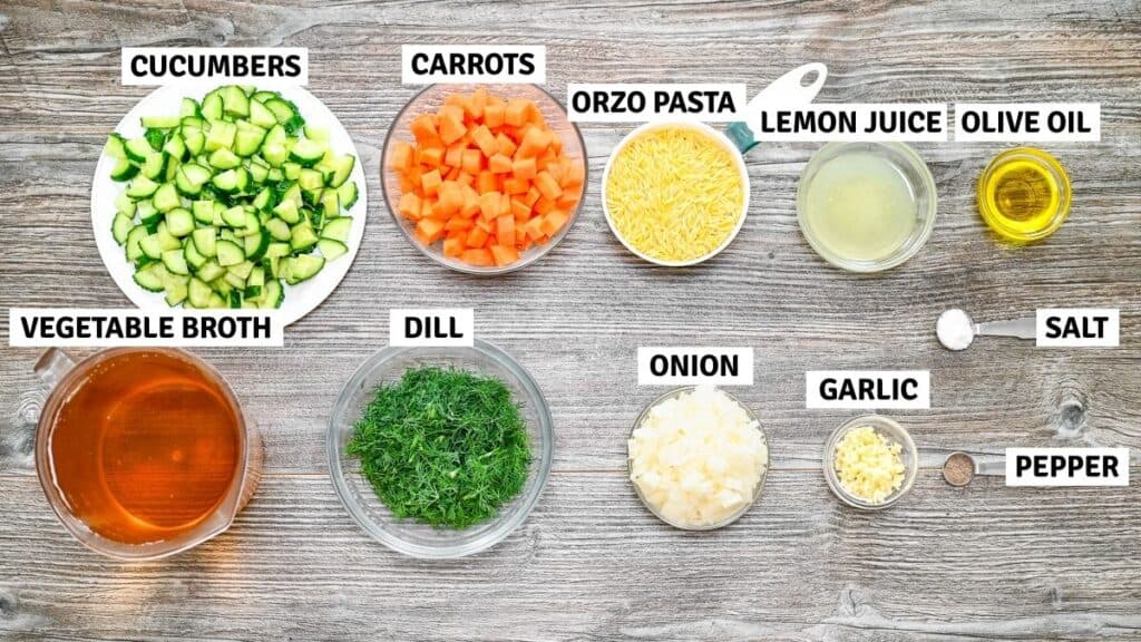 Ingredients for the soup arranged on a wooden table.
