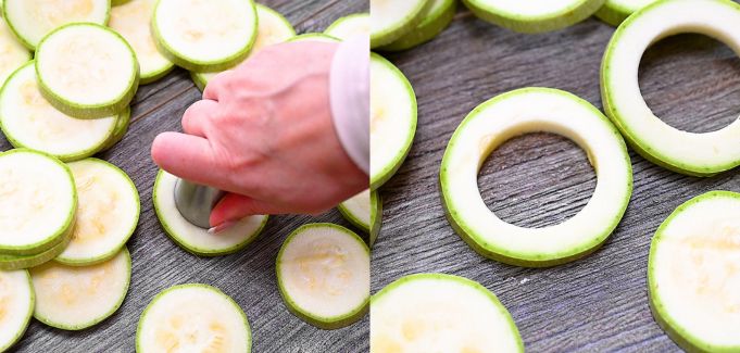 Cutting out the center from a zucchini round using a cutter.