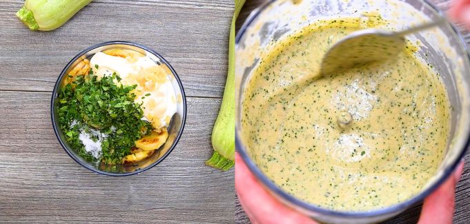 Adding fresh herbs, spices, and fried zucchini cores into a blender cup, and blending them into a smooth green sauce.