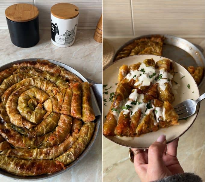 Slicing golden baked spiral cabbage rolls into wedges and serving a slice on a plate topped with vegan sour cream and parsley.